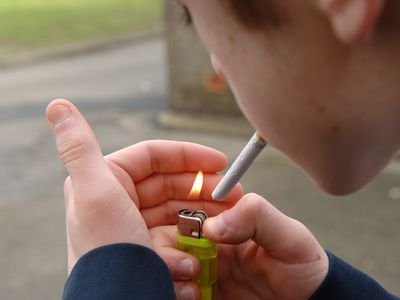 teen boy smoking