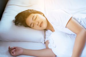 woman sleeping grinding teeth