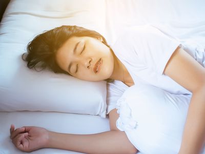 woman sleeping grinding teeth