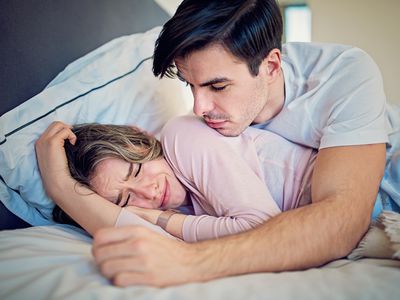 Man is trying to calm his crying girlfriend