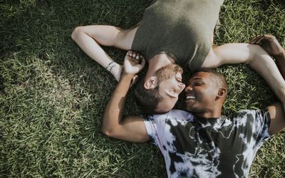 couple relaxing in the grass