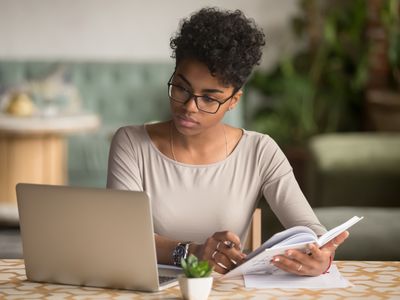 young woman studying at her computer