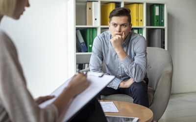 Man in therapy session