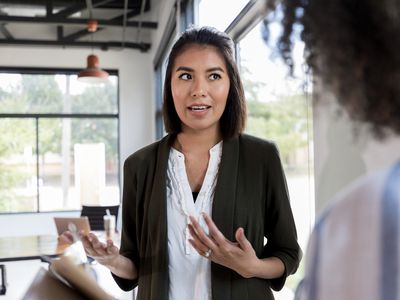 Woman being defensive at work.