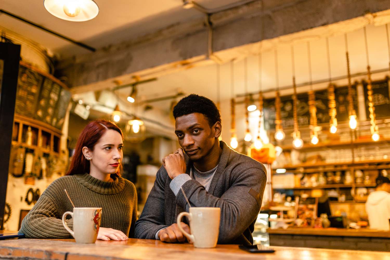 young couple talking through a conflict