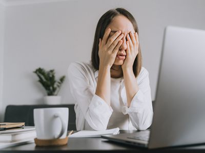 woman frustrated at desk