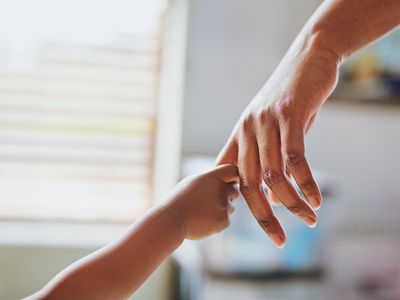 Shot of an unrecognizable little girl holding her mothers hand 