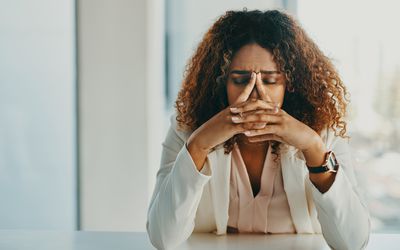 person stressed at work