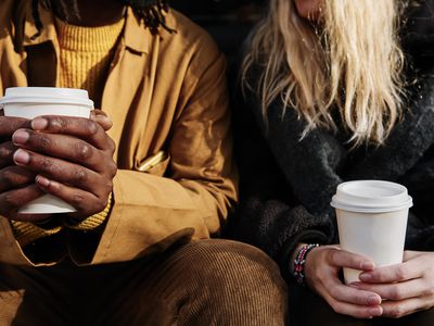 people holding coffee