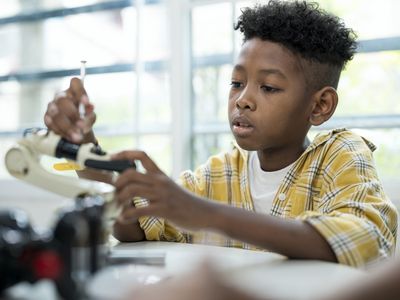 young boy in school classroom