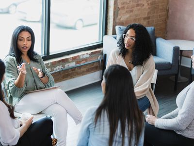 group therapy with a diverse group of people sitting in a circle