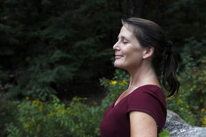 Woman breathing in fresh outdoor air