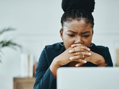 woman looking at computer screen