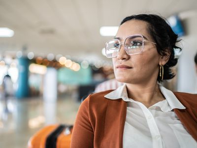 Businessman contemplating in the departure area at airport