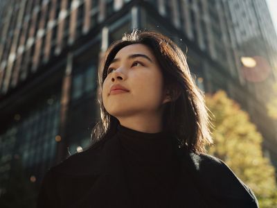 woman walking around a city in the daytime