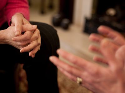 Therapist talking with patient