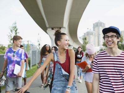 teenagers laughing and walking