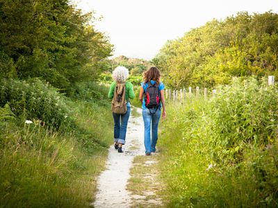 Mother and daughter on nature walk