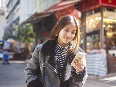 Young woman at mobile phone