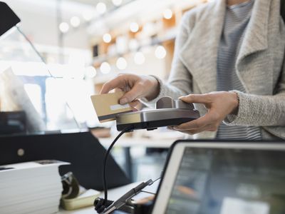 woman using credit card