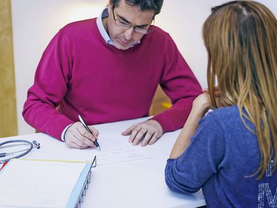 Doctor Writing a Prescription