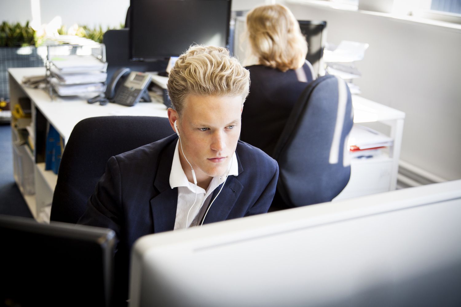 Young business man working at his desk