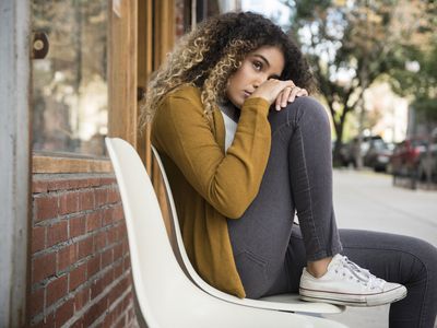 person stressed on bench