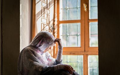 Muslim woman with traditional Middle Eastern modest clothes