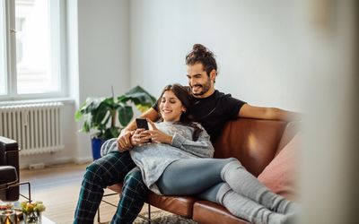 Couple laying on the couch