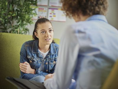 Young woman talking with a therapist