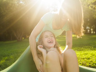 Child and mother laughing