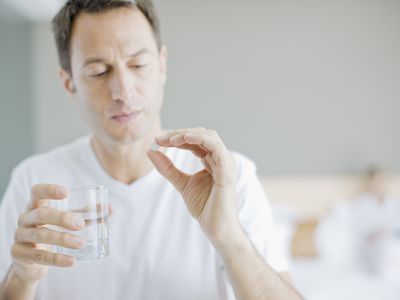 Man taking Zyban to help him quit smoking