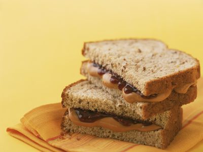 Peanut butter and jelly sandwich on whole grain bread