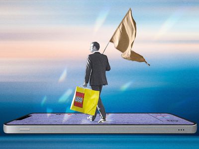 Man in suit holding a beige flag and lego bag