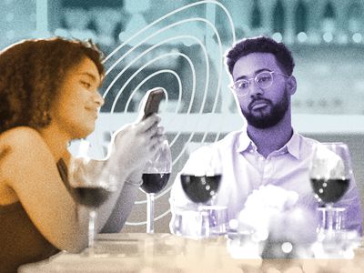 Woman phubbing her partner at dinner