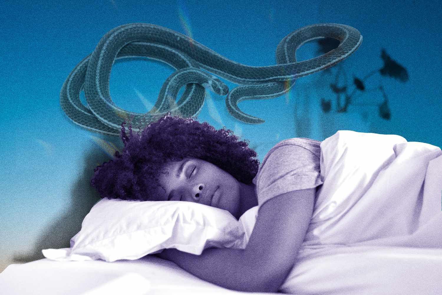 woman lying in bed dreaming about snakes