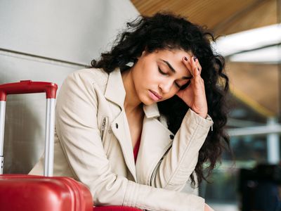 Upset woman at airport