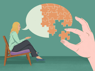 Therapist sitting down with puzzle pieces in speech bubble