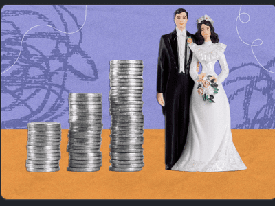 A man and a woman embracing one another, as they stand next to columns of quarters. 